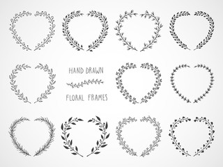 Vector set of floral hand drawn frames in the shape of a heart. 