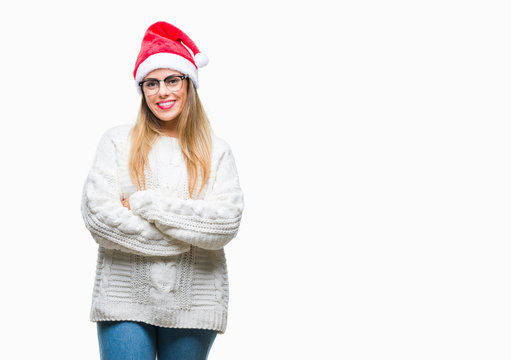 Young beautiful woman wearing christmas hat over isolated background with a happy and cool smile on face. Lucky person.