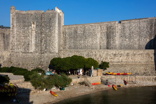 Dubrovnik, Croatia, July 31, 2018: Dubrovnik city walls, the finest in the world and the city's main claim to fame. Entire old town was contained within a stone barrier 2km long and up to 25m high.