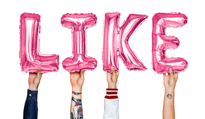Pink alphabet helium balloons forming the text like