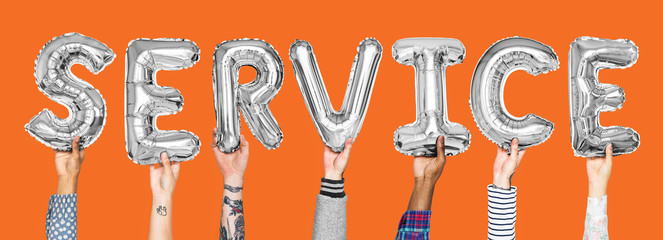 Silver gray alphabet balloons forming the word service