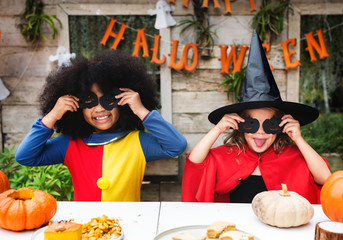 Kids in costume enjoying the Halloween season