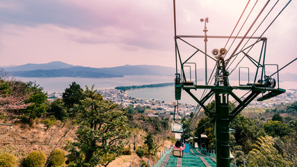 Chair lift service for travller to the mountain peak at Amanohashidate , Kyoto , Japan