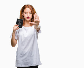 Young beautiful woman holding passport of italy over isolated background with open hand doing stop sign with serious and confident expression, defense gesture