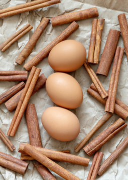 Organic brown eggs with natural cinnamon sticks.