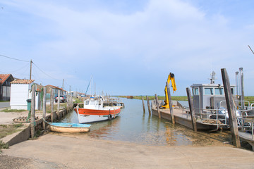 Oyster cabine and boats from fisherman