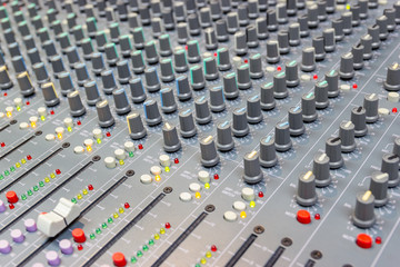 Fototapeta premium Close up Mixing Console of a big HiFi system, The audio equipment and control panel of digital studio mixer