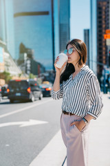 lady relaxing looking at the busy urban