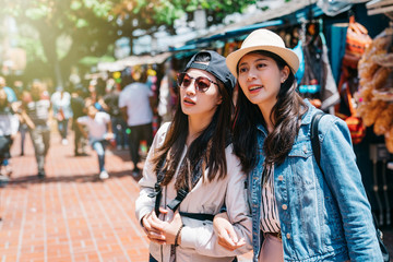 pretty women standing in the market