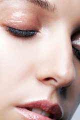 Closeup macro shot of female face and eyes makeup