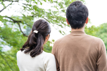 young asian couple in park