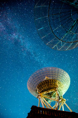 Radio telescopes and the Milky Way at night