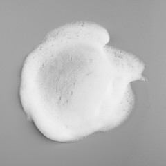 Foam bubble on gray background on top view object beatuy health care concept design