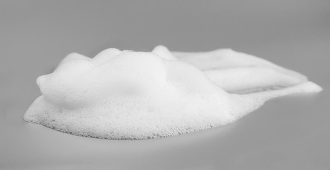 Soap foam bubble isolated on gray background object beatuy health care concept