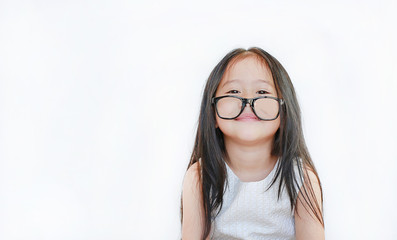 Portrait of happy little girl with glasses on white background.