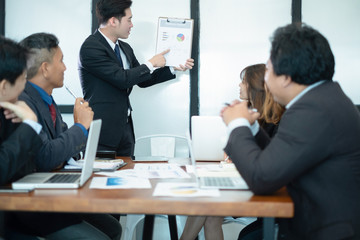 business people meeting brainstorming and discussing project together in office, teamwork concept