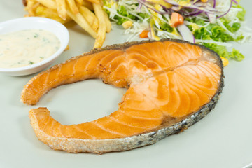 Salmon steak in a dish Close up. with copy space for your text..