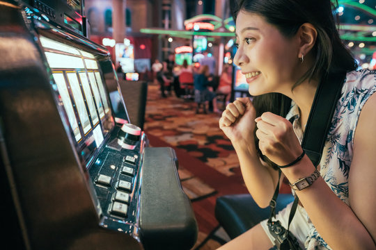 Asian Gambling In Casino Playing Slot Machines