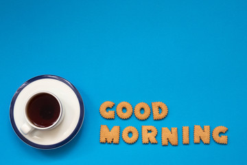 Good Morning ,Cup of coffee with the alphabet letters with cookies biscuits