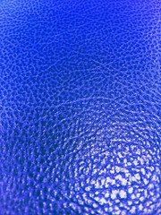 Obraz premium Bright biue leather background closeup