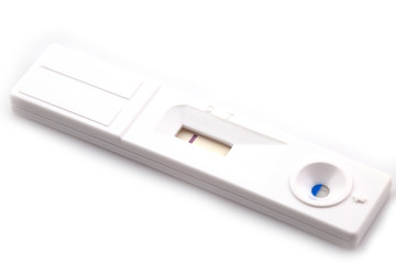 White plastic pregnancy test isolated on white