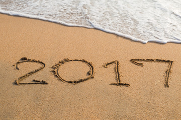 2017 text written,  message written in the sand