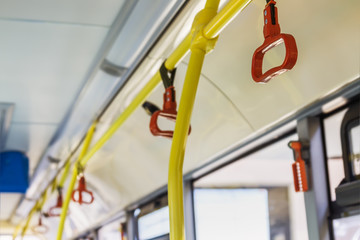 handrails in the cabin of a modern and comfortable city bus or electric bus © OlegDoroshin