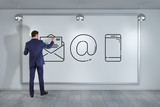 Businessman drawing thin line contact icon