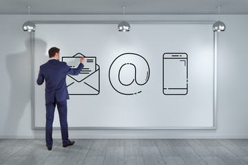 Businessman drawing thin line contact icon