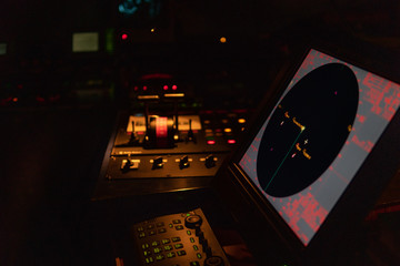 Marine navigational equipment on modern ship or vessel. Night view