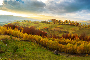 Warm October evening in Transylvania. Magic autumn sunset landscape