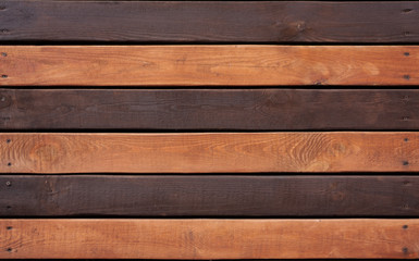 Naklejka premium Wooden texture background. brown and white wooden boards with the nails