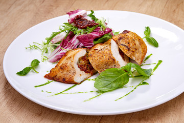 chicken breast with salad