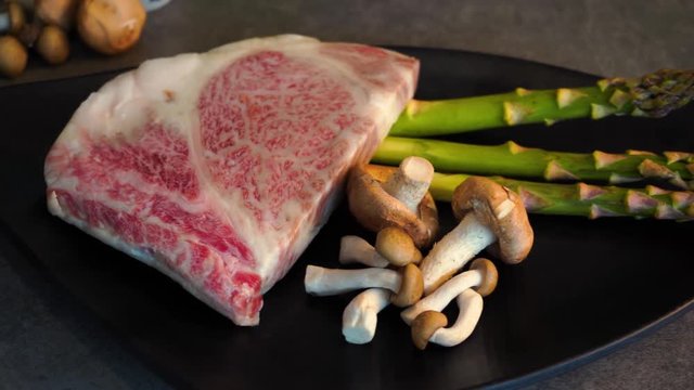 Premium Kobe beef with asparagus and mushrooms