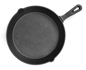 Cast iron pan with empty space, isolated on white background. Cut out object with top view or high angle view and copy space.