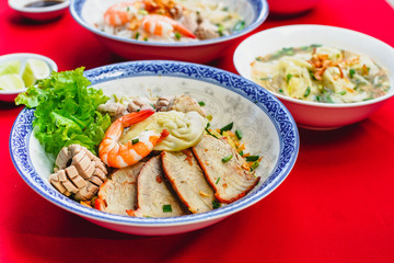 Set of Vietnamese Noodles with Pork and Shrimp Recipe bowl combo on the red carpet 