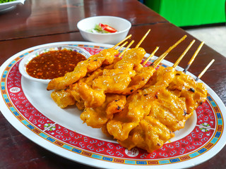 Grilled pork satay with peanut sauce and toast, Thai food