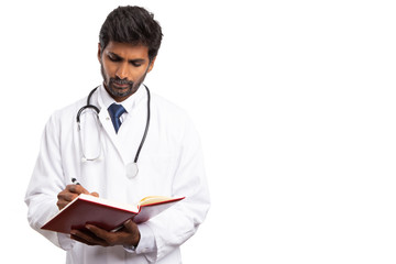 Fototapeta premium Medic writing in agenda.
