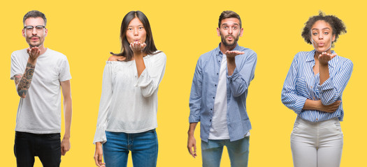 Collage of group people, women and men over colorful yellow isolated background looking at the camera blowing a kiss with hand on air being lovely and sexy. Love expression.