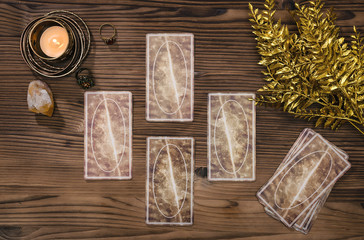 Tarot cards on fortune teller desk table background. Futune reading concept. Divination.