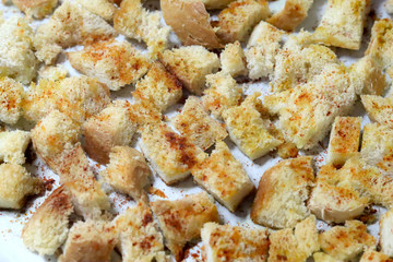 dried baked crispy bread crumbs with garlic, salt and paprika powder,close up  