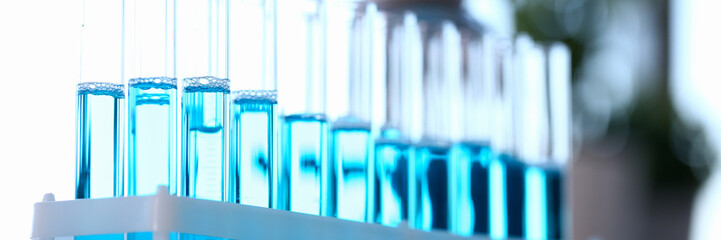 Test tube of glass overflows liquid solution potassium