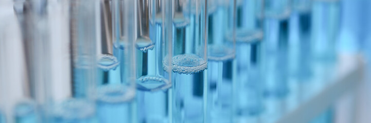 Test tube of glass overflows liquid solution potassium