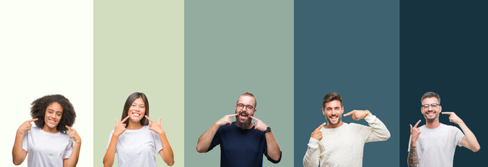 Collage of group of young people over colorful isolated background smiling confident showing and pointing with fingers teeth and mouth. Health concept.