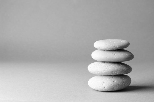 Fototapeta Stack of grey massage stones