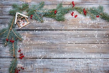 Xmas or New Year background holiday plain composition made of Christmas decorations on a wooden background