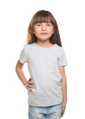 Fototapeta premium Little girl in t-shirt on white background
