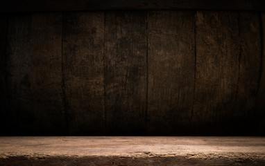 Old wood table top with smoke in the dark background.
