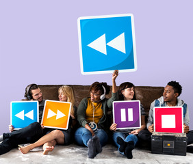 People holding media player icons and a rewind button