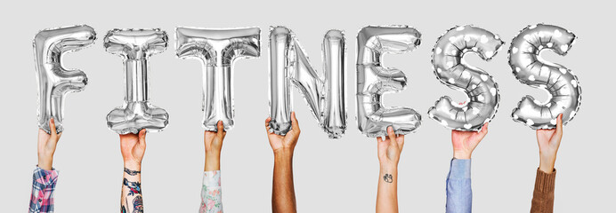 Hands showing fitness balloons word
